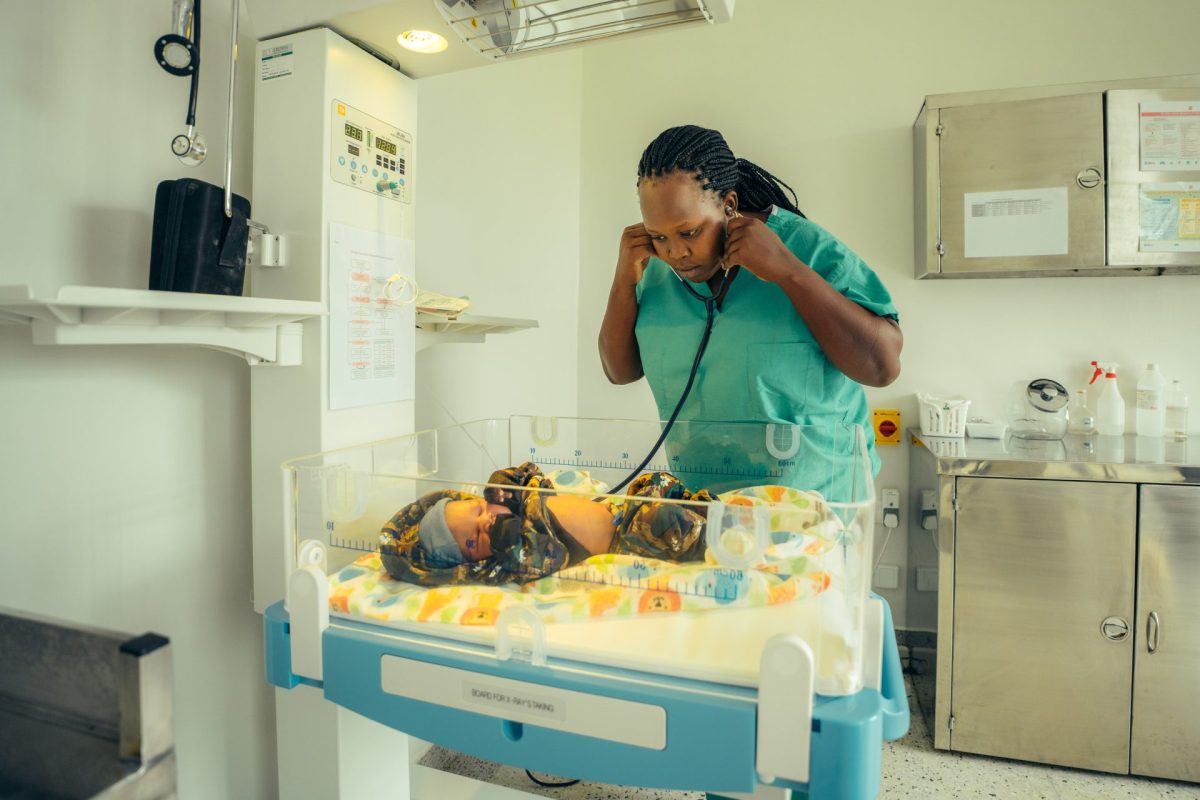 Patient receiving care at AMS Health Center in the Maasai community